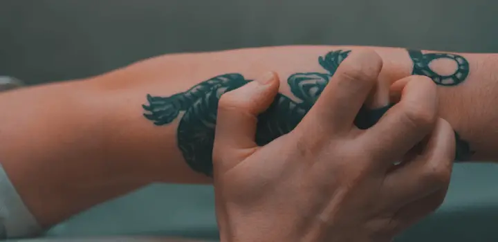 Scratching on Tattoo