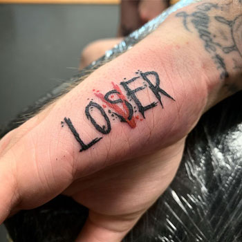 lover loser tattoo on hand
