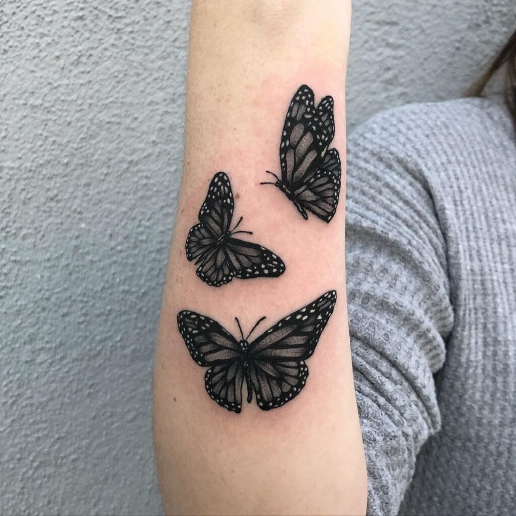 Black Butterfly on Hand